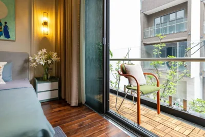 Studio with Balcony — Well-being Home - Self-Service